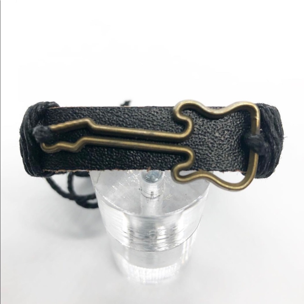 Black leather bracelet.